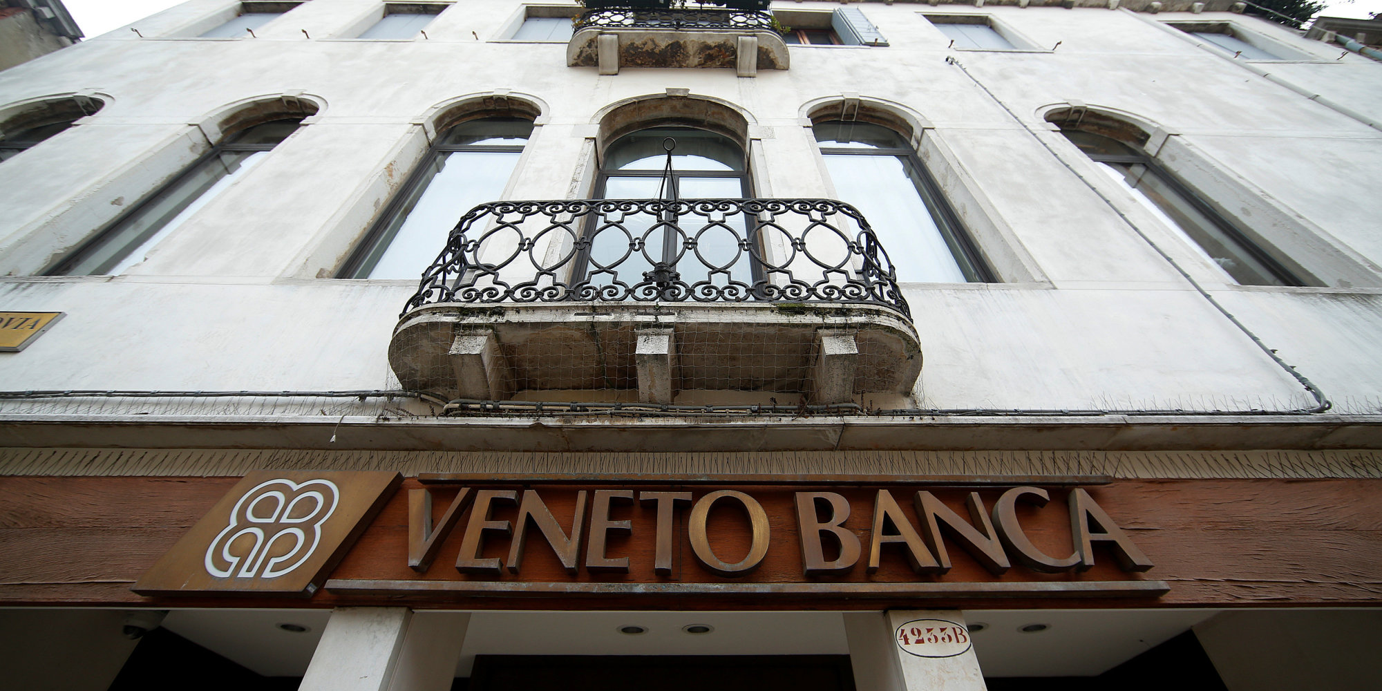The logo of Veneto Banca bank is seen in Venice