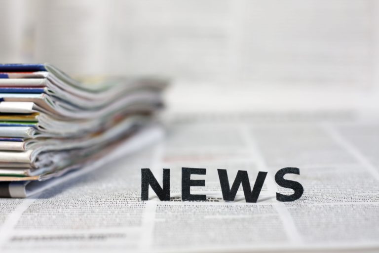 20165301 - news letters on newspapers with blurred background concept