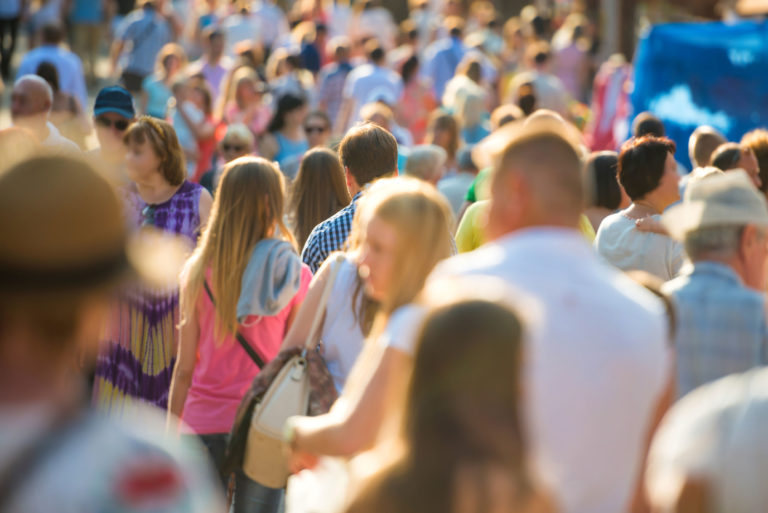 47154163 - crowd of people walking on the busy city street.