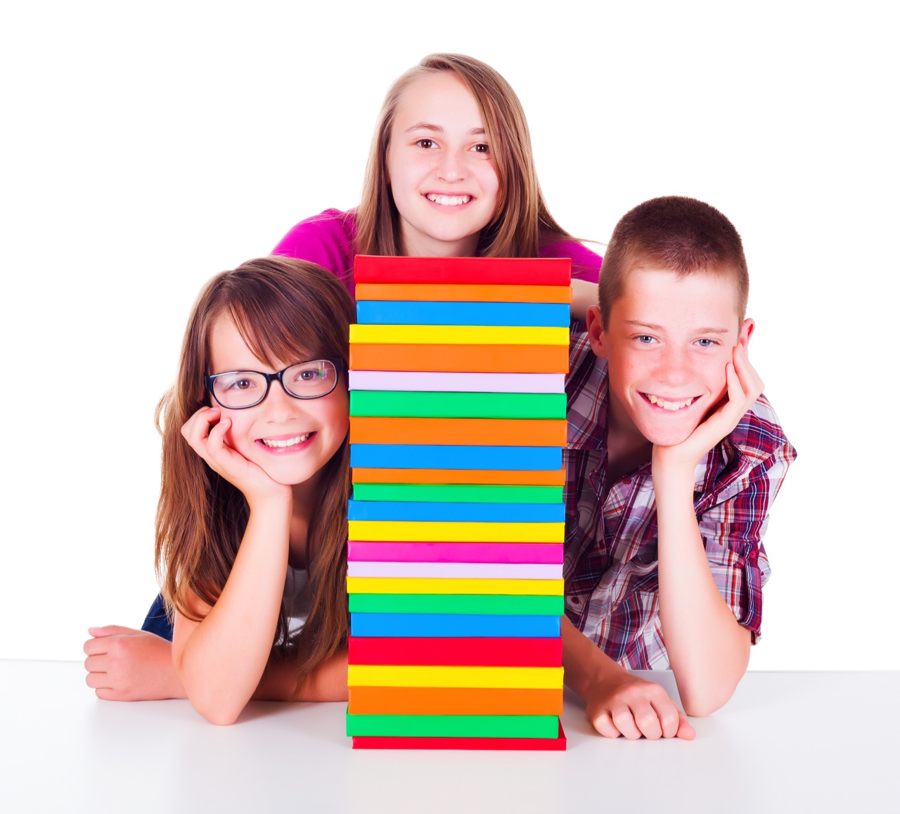 Teenagers next to book column