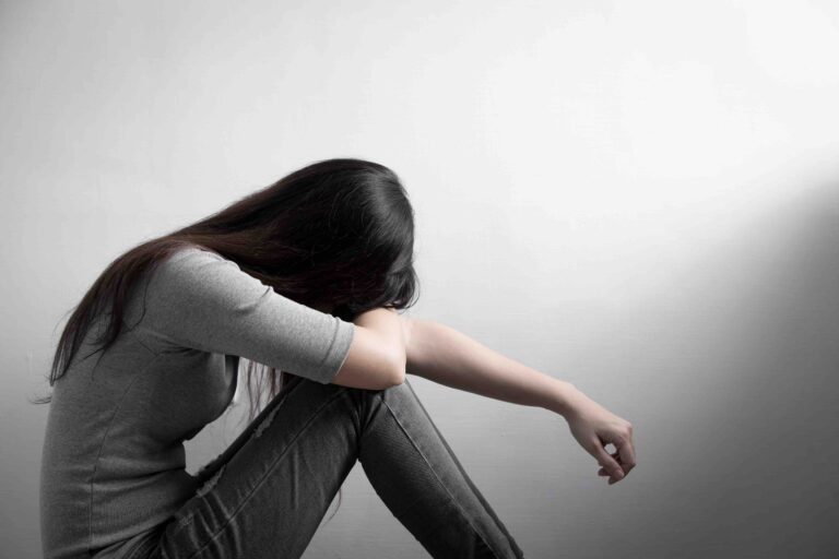 depression woman sit on floor