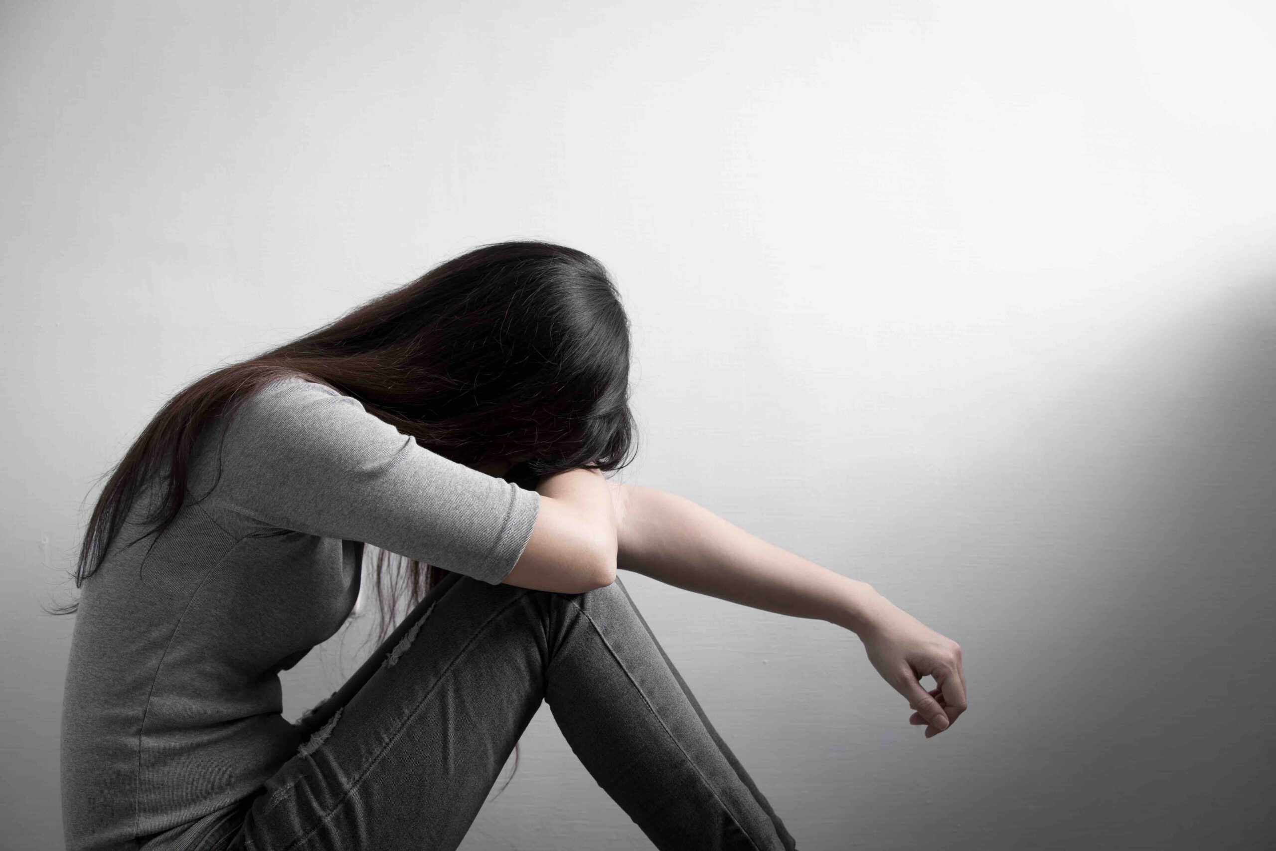depression woman sit on floor